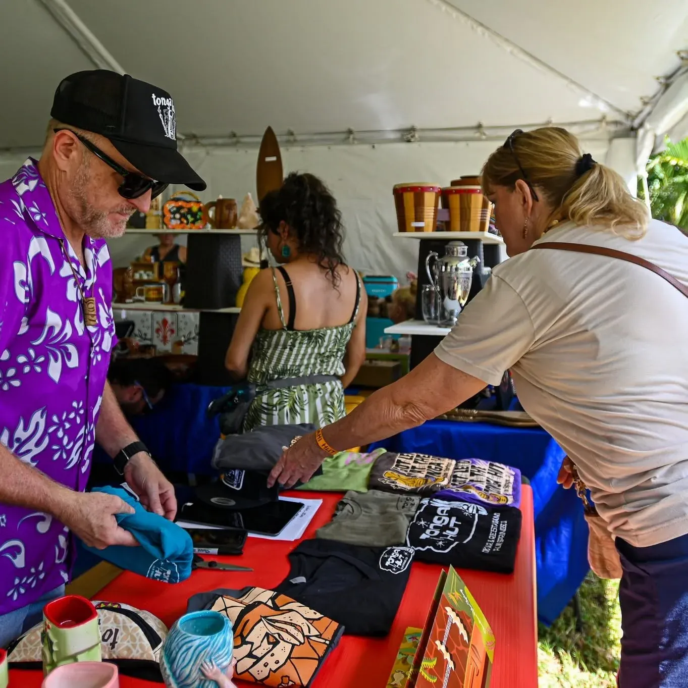Artists and vendors at a Tiki Fever marketplace